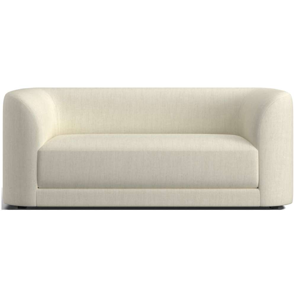 Fabric Quartz (Tribute Twill) Crate & Barrel Contour Sofa featuring ivory twill upholstery, curved sides, and a clean contemporary design