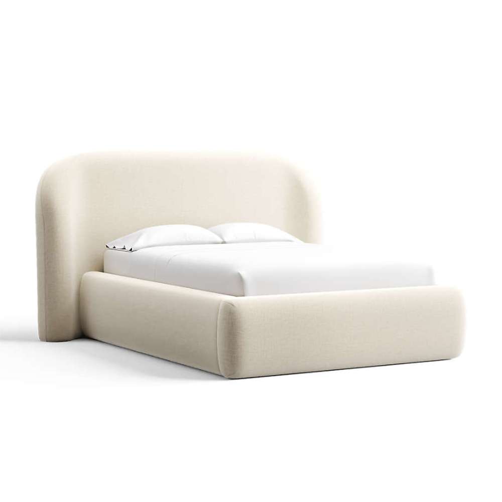 Fabric Sand (Doux Chenille) Crate & Barrel Adelaide Curved Upholstered Bed upholstered in creamy sand chenille with a curved headboard and cushioned frame