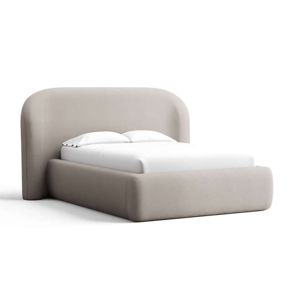 Fabric Sand (Icon Chenille) Crate & Barrel Adelaide Curved Upholstered Bed in light sand chenille with a rounded headboard and fully upholstered base
