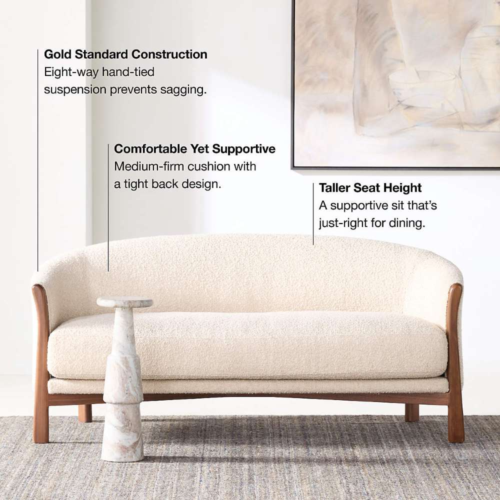 Fabric Tapioca (Lucie Boucle) Crate & Barrel Contour Sofa displayed with labels highlighting its hand-tied suspension, supportive cushion, and taller seat height