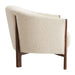 Fabric Tapioca (Lucie Boucle) Crate & Barrel Contour Sofa side view highlighting its curved cream boucle back and solid walnut wood frame