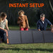 Family quickly sets up Jackery SolarSaga 200W Solar Panel on grass, highlighting its easy and fast deployment