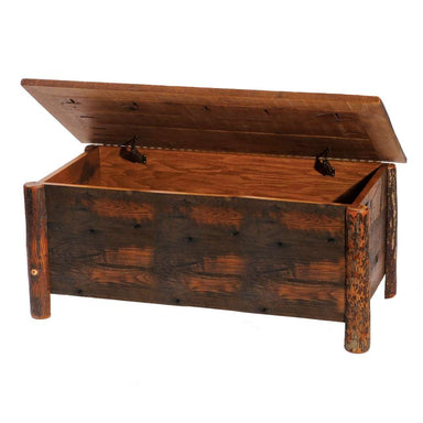 Fireside Lodge Appalachian Blanket Chest is a rustic wooden chest with log-style legs and an open hinged lid revealing a roomy storage space