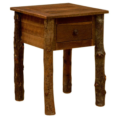 Fireside Lodge Appalachian One Drawer Nightstand is a small rustic wood table with a square top, one drawer, and log-style legs