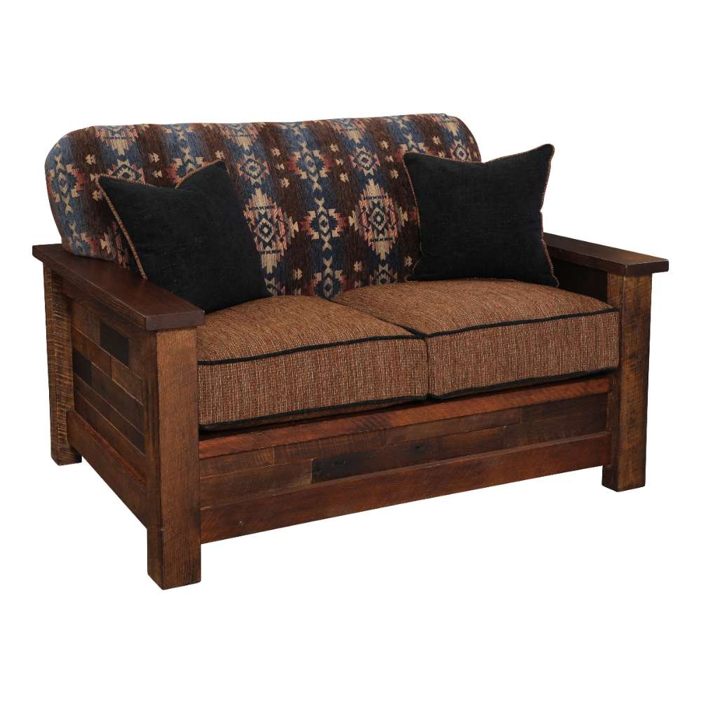 Fireside Lodge Barnwood Americana Loveseat with a rustic wooden frame, patterned backrest, brown seat cushions, and two dark accent pillows