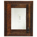 Fireside Lodge Barnwood Inset Medicine Cabinet is a rustic wooden medicine cabinet with a natural barnwood frame, mirrored door, and metal ring pull handle