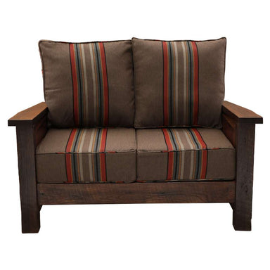 Fireside Lodge Barnwood Loveseat appears fully assembled with two brown striped seat cushions and two matching back cushions snugly fitted inside the wooden frame
