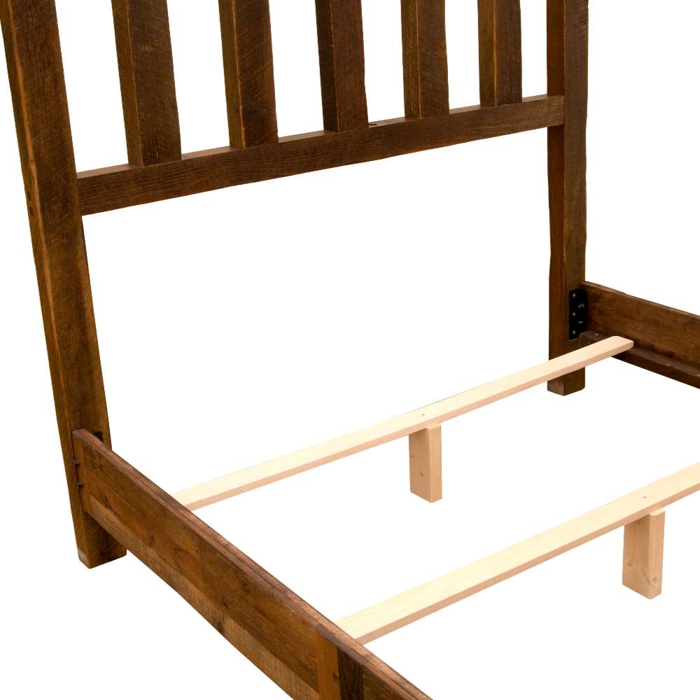 Fireside Lodge Barnwood Post Bed is shown from a close-up angle highlighting the rustic wooden frame and light-colored slats that support the mattress