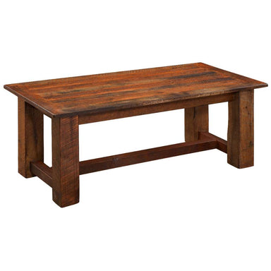 Fireside Lodge Barnwood Rectangle Coffee Table - 48 x 24 from an angled view displaying its long rustic wooden top and thick block-style legs