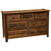 Fireside Lodge Barnwood Seven Drawer Dresser is shown at an angle with all drawers closed, highlighting its farmhouse-style wood grain