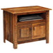 Fireside Lodge Barnwood Television Stand made of rustic wood with an open shelf and two small cabinet doors underneath