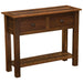 Fireside Lodge Barnwood Two Drawer Sofa Table is a rustic wooden table with two front drawers, sturdy square legs, and a lower shelf, shown standing alone against a white background