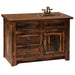 Fireside Lodge Barnwood Vanity - 36-Inch is a rustic barnwood bathroom vanity with three drawers, one cabinet door, and a copper sink set in a smooth countertop