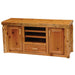 Fireside Lodge Cedar Log Entertainment Center appears as a rustic wooden media cabinet made of natural cedar logs, featuring two side doors, open center shelves, and a lower drawer