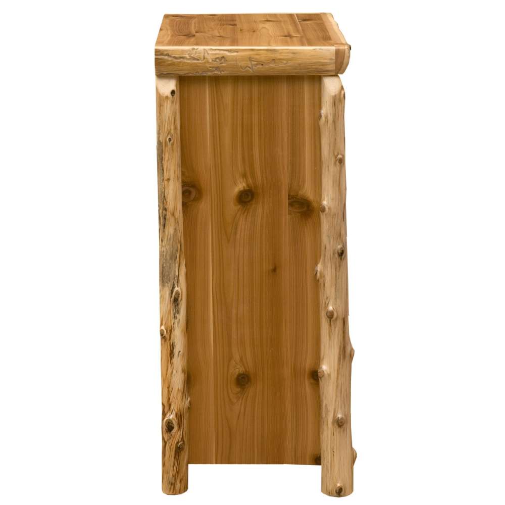 Fireside Lodge Cedar Log Four Drawer Chest is shown from the side, focusing on the vertical cedar logs, knots, and natural wood grain