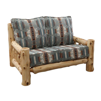 Fireside Lodge Cedar Log Loveseat is shown angled, highlighting its handcrafted cedar-log structure and thick patterned cushions that create a cozy rustic style
