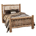 Fireside Lodge Cedar Log Small Spindle Bed is fully assembled with neutral bedding, highlighting its tall log headboard and natural wood texture