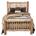 Fireside Lodge Cedar Log Small Spindle Bed is shown fully made, with a rustic cedar log headboard and footboard featuring natural knots and spindles