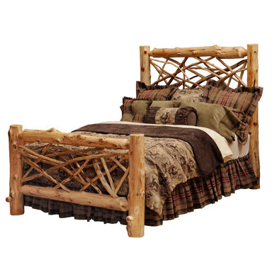 Fireside Lodge Cedar Log Twig Bed shows a rustic log bed with thick cedar posts, a twig-style headboard and footboard, and layered lodge-style bedding