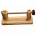 Fireside Lodge Cedar Log Wall-Mount Toilet Paper Holder made from rustic cedar logs with a horizontal rod between two log posts on a wood base