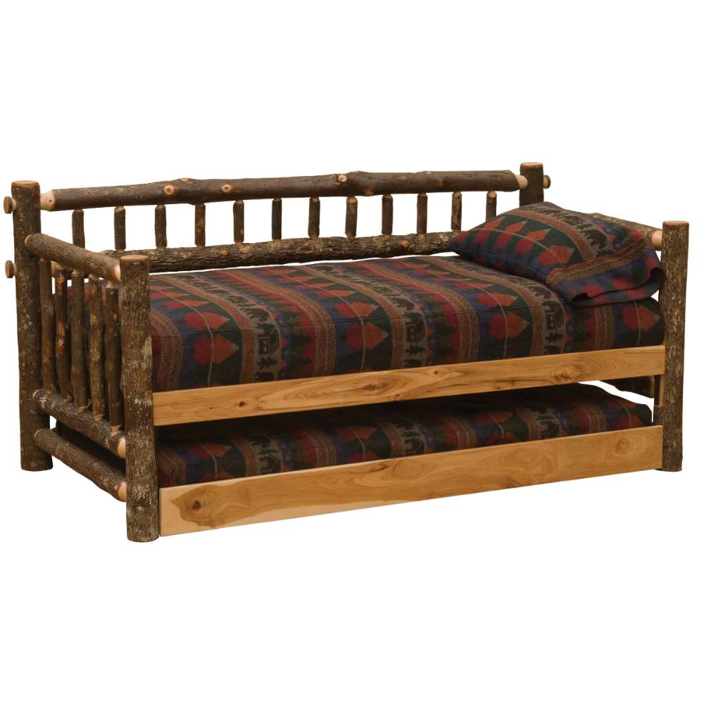 Fireside Lodge Hickory Log Daybed With Roll Out Trundle is a rustic hickory log daybed with a patterned mattress and a trundle bed stored underneath