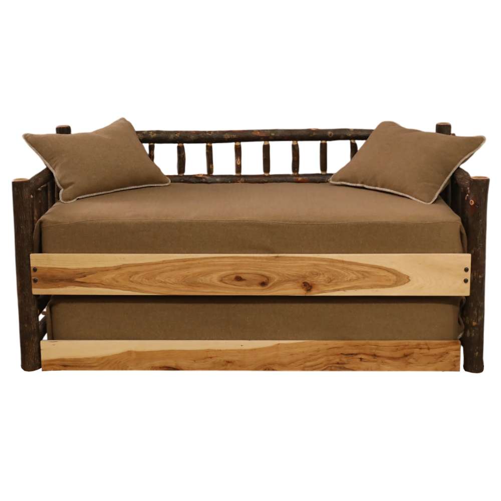 Fireside Lodge Hickory Log Daybed With Roll Out Trundle shows a front view with brown cushions and the trundle stored underneath