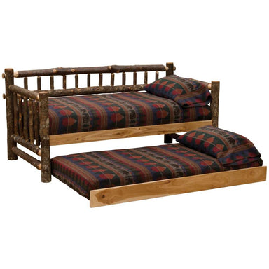Fireside Lodge Hickory Log Daybed With Roll Out Trundle shows the log daybed with the lower trundle pulled out to reveal a second matching mattress