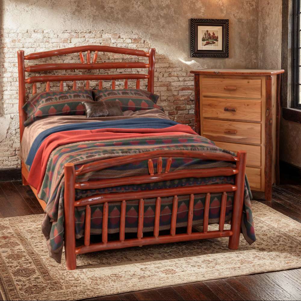 Fireside Lodge Hickory Log Five Drawer Chest sits beside a rustic log bed, featuring five stacked drawers and log-style framing