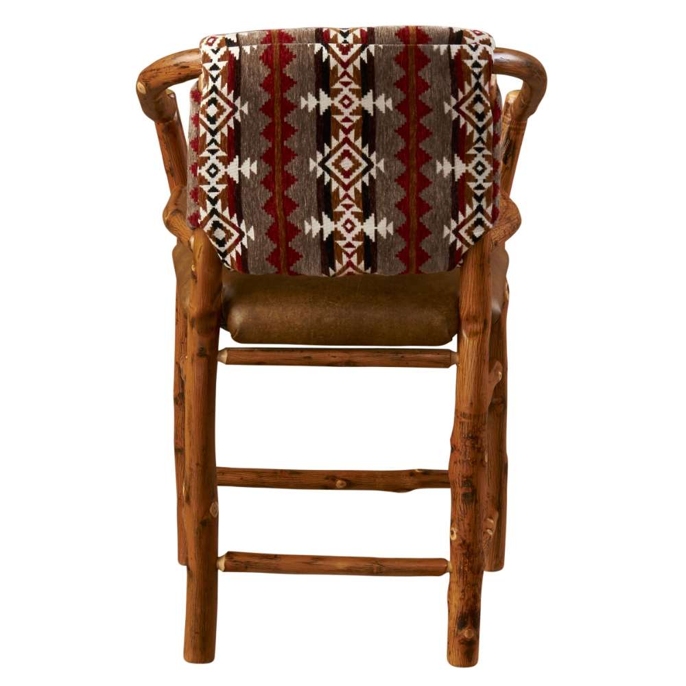 Fireside Lodge Hickory Log Hoop Counter Stool with Back rear view shows its sturdy log frame, ladder-style rungs, and woven Southwestern fabric backrest