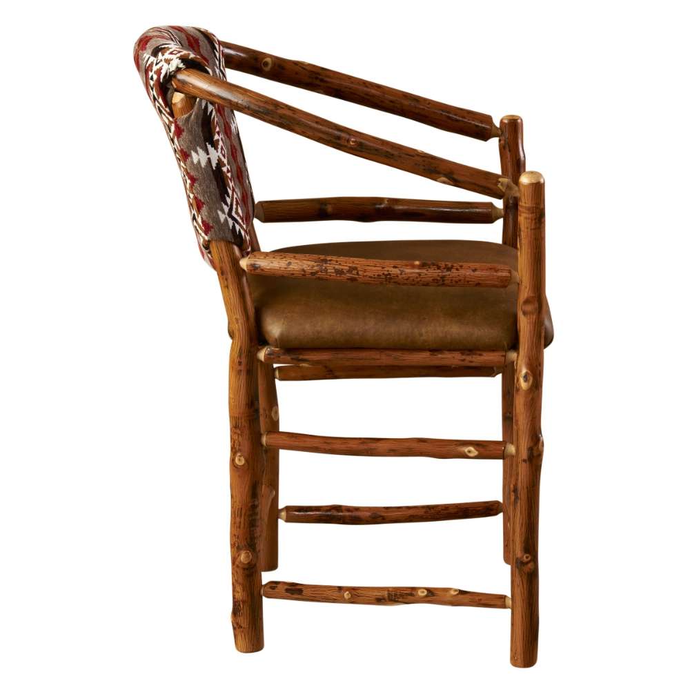 Fireside Lodge Hickory Log Hoop Counter Stool with Back side view highlights curved armrests, solid log legs, footrests, and a brown leather seat