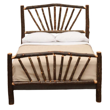 Fireside Lodge Hickory Log Sunburst Bed with pillows and mattress clearly displaying the symmetrical sunburst pattern on the headboard