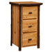 Fireside Lodge Hickory Log Three Drawer File Cabinet is shown at a slight angle with drawers closed, emphasizing its sturdy log legs and rustic design