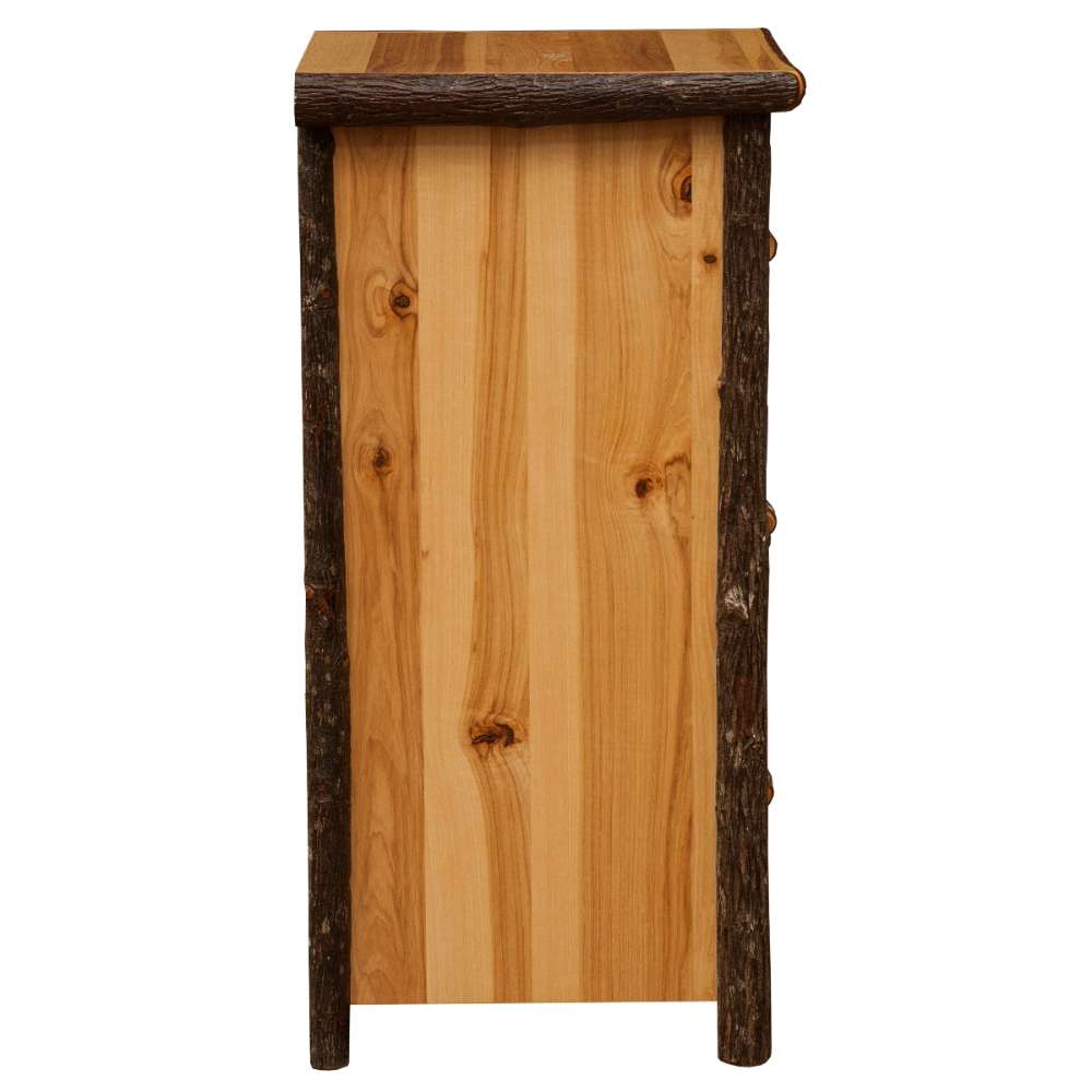 Fireside Lodge Hickory Log Three Drawer File Cabinet is shown from the side with light hickory panels, dark log supports, and a flat wooden top