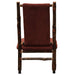 Fireside Lodge Hickory Log Upholstered Executive Chair With Casters is shown from the back with a tall padded burgundy backrest and a rustic log frame on wheels