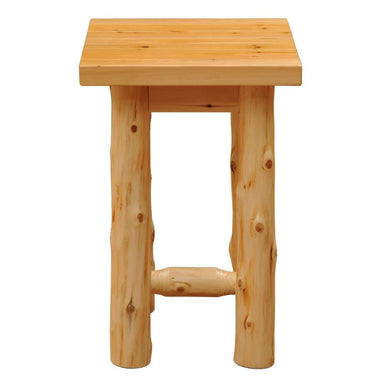 Fireside Lodge Voyageur Log Nightstand with a thick wood top, two log legs, and one bottom support bar