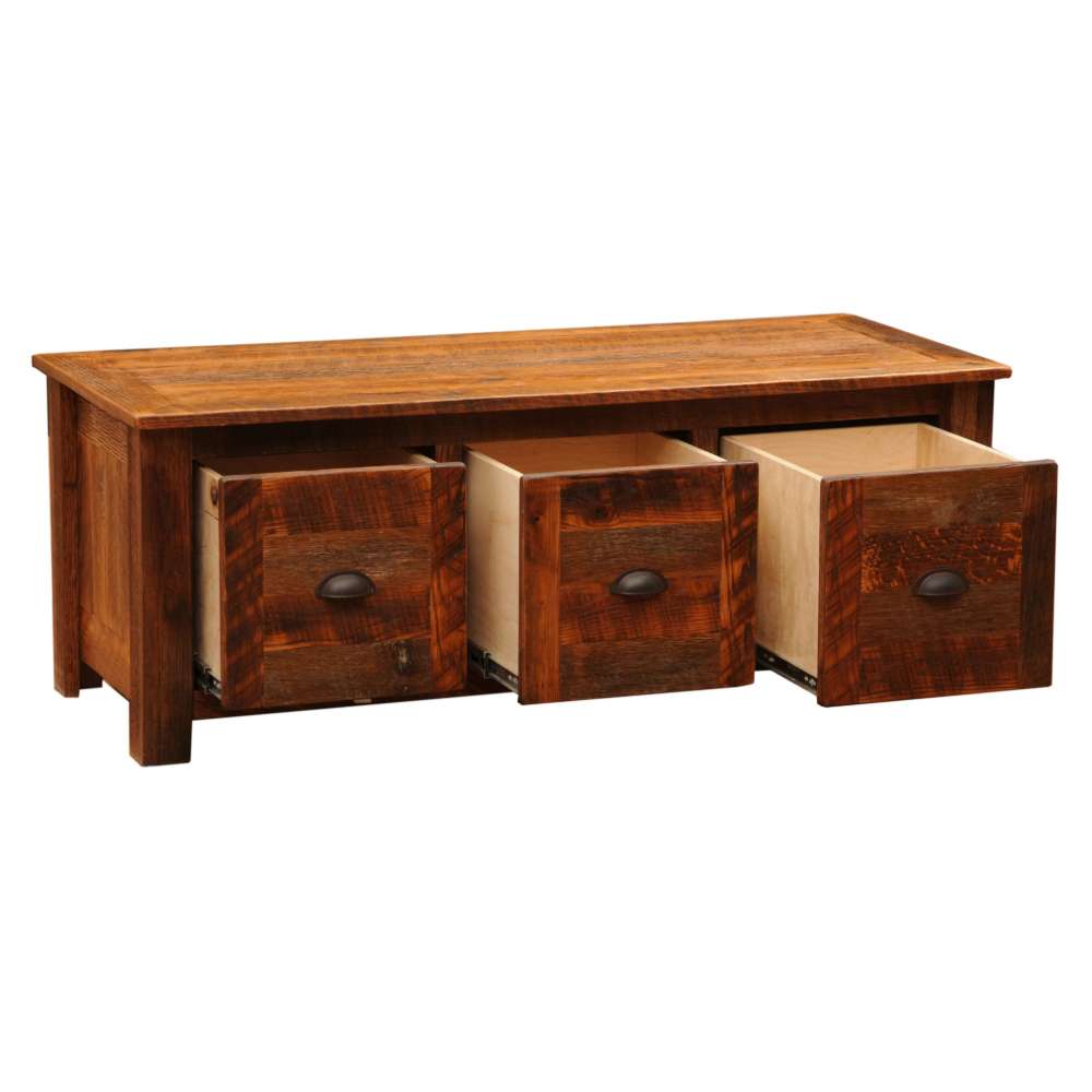 Fireside Lodge Barnwood Enclosed Coffee Table is a rustic wooden table with three pull-out drawers, offering practical storage with a warm, reclaimed wood finish