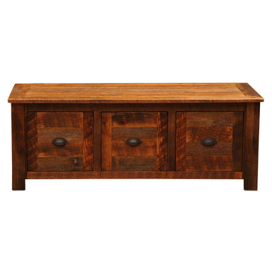 Fireside Lodge Barnwood Enclosed Coffee Table presents a front view of its rich wooden texture and three evenly spaced drawers with metal handles