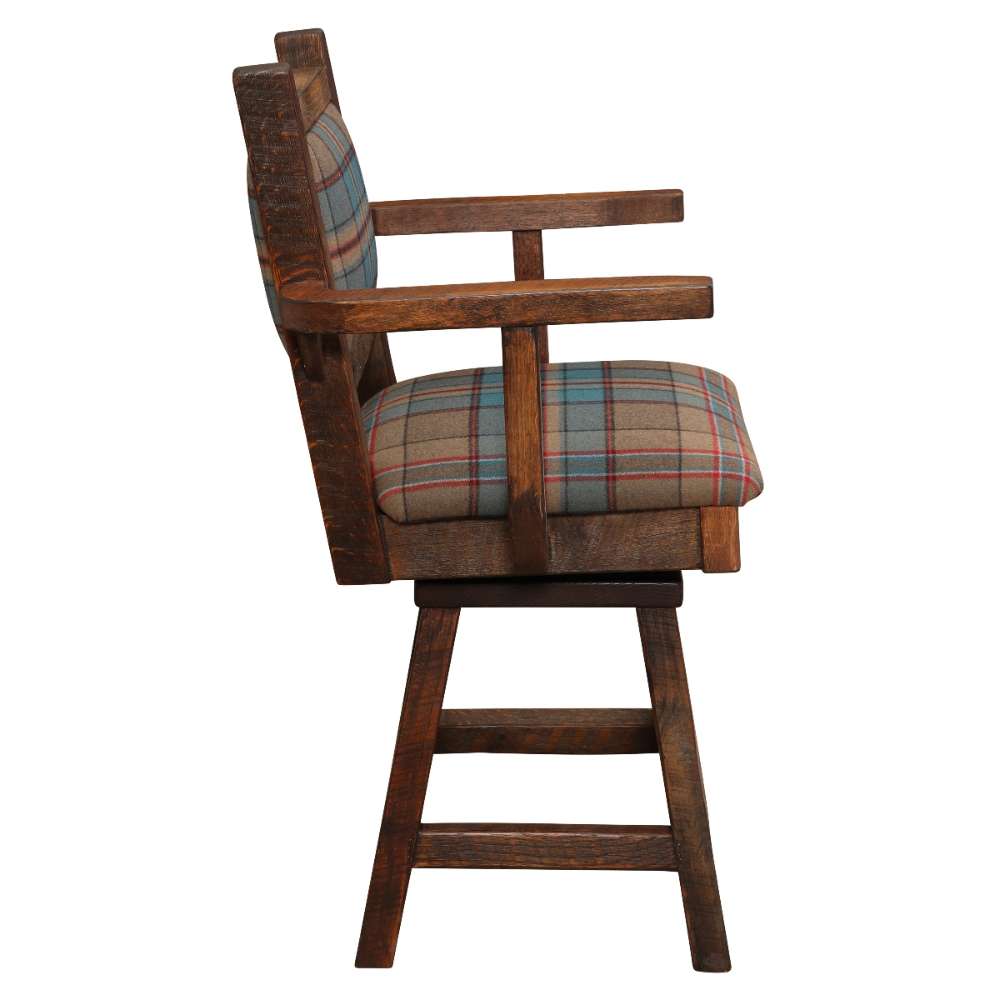 Fireside Lodge Barnwood Colonial Swivel Counter Stool with Arms is pictured from the side, revealing its thick padded seat, straight wooden arms, and durable swivel legs