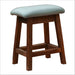 Fireside Lodge Barnwood Saddle Counter Stool has a cushioned light-blue seat on a sturdy reclaimed wood base