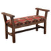 Fireside Lodge Barnwood Upholstered Bench with Arms showcases angled wooden armrests and a sturdy reclaimed wood base complemented by a colorful tribal-inspired upholstered seat