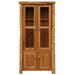 Fireside Lodge Cedar Log Eight Gun Cabinet is shown closed, highlighting its natural cedar wood finish and rustic glass-paneled upper doors