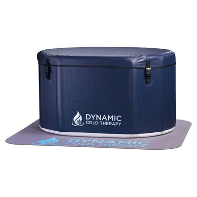Fitted insulated cover secures Golden Designs Dynamic Cold Therapy Inflatable Oval Cold Plunge while it rests on a branded protective floor mat