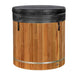 Fitted with a black insulated cover and side latches, Golden Designs Dynamic Cold Therapy PVC Barrel Cold Plunge shows its cedar staves and lower steel band