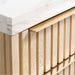 Fluted white oak drawer fronts and brass pulls on Crate & Barrel Batten 62" White Oak Wood Console Desk with White Marble Top