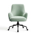 Forest Covet Velvet Crate & Barrel Bellevue Upholstered Office Chair in pale forest green velvet with a rounded silhouette and black rolling base