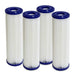 Four tall white pleated cartridges with navy blue end caps stand side by side in this view of Golden Designs Dynamic Cold Therapy 10x2.5 20 Micron Filters (4 Pack)