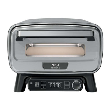 From the front, Ninja Artisan 5-in-1 Portable Electric Pizza & Outdoor Oven shows its large handle, viewing window, and digital controls