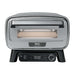 From the front, Ninja Artisan 5-in-1 Portable Electric Pizza & Outdoor Oven shows its large handle, viewing window, and digital controls