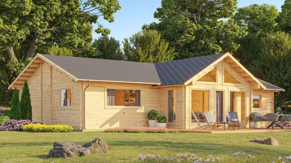 Front-angle view shows the GardenHouse24 USA Francesca 70 Garden Room with a wide deck, lounge chairs, potted plants, and vibrant landscaping