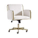 Front angled view of Crate & Barrel Caterina Natural Upholstered Office Chair with Brass Base, featuring a cushioned seat, upholstered arms, and warm brass detailing